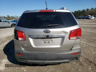 2013 Kia Sorento LX с VIN 5XYKT3A69DG423616, выставлен на аукционе Copart как лот 42883765 с пробегом 207 984 миль миль и Списание • Salvage title. История ставок и продаж доступна на DreamBid. Изображение 6.