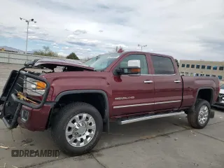 2016 GMC Sierra 2500HD Denali z VIN 1GT12UE85GF220987, wystawiony jako Copart lot #50966885 z przebiegiem 95 424 mil mil oraz Szkoda całkowita • Salvage title. Historia ofert i sprzedaży dostępna na DreamBid. Obrazek 1.