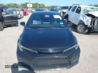 2021 Toyota Corolla SE with VIN JTDS4MCE5MJ056494, listed as a IAAI auction lot 41936866 with 128,257 mi miles. Bid and sale history available at carsss.com. Image 12.