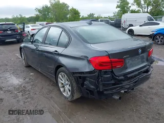 2018 BMW 3 Series 320i xDrive with VIN WBA8A3C5XJA505917, listed as a IAAI auction lot 42279882 with 89,537 mi miles and . Bid and sale history available at DreamBid. Image 3.