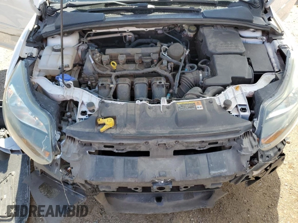 2014 Ford Focus Titanium with VIN 1FADP3J26EL132223, listed as a Copart auction lot 71490004 with 131,233 mi miles and Salvage Title. Bid and sale history available at DreamBid. Image 12.