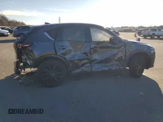 2022 Mazda CX-5 2.5 Turbo with VIN JM3KFBAY2N0596945, listed as a Copart auction lot 86427694 with Not Provided miles and Salvage Title. Bid and sale history available at carsss.com. Image 3.