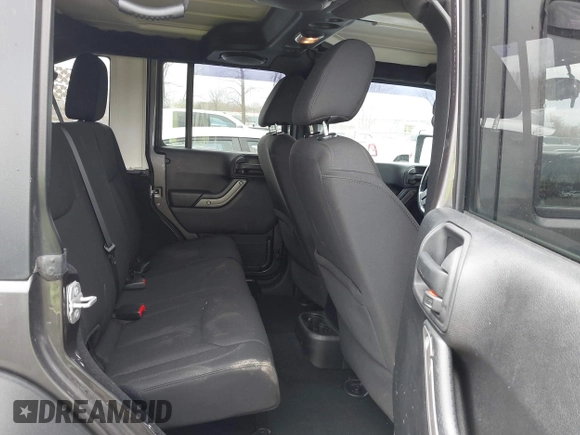 2014 Jeep Wrangler Unlimited Sport with VIN 1C4BJWDG6EL239378, listed as a IAAI auction lot 42073392 with 120,999 mi miles. Bid and sale history available at carsss.com. Image 8.