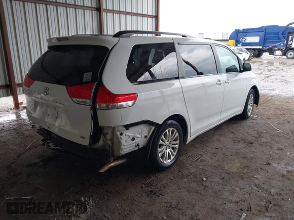 2014 Toyota Sienna XLE with VIN 5TDYK3DC6ES444121, listed as a IAAI auction lot 42110190 with 240,366 mi miles and . Bid and sale history available at DreamBid. Image 4.