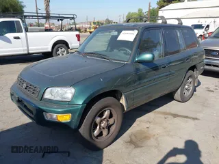 2000 Toyota RAV4 with VIN JT3GP10V4Y7067848, listed as a IAAI auction lot 42689181 with 174,750 mi miles and . Bid and sale history available at DreamBid. Image 2.