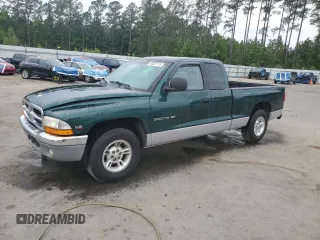 2000 Dodge Dakota z VIN 1B7GL22X5YS632911, wystawiony jako Copart lot #55257115 z przebiegiem 156 561 mil mil oraz Szkoda całkowita • Salvage title. Historia ofert i sprzedaży dostępna na DreamBid. Obrazek 1.