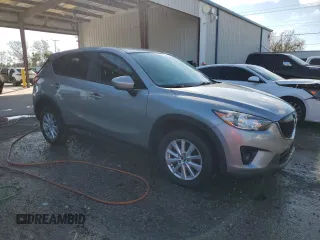 2014 Mazda CX-5 Touring with VIN JM3KE2CY8E0305641, listed as a Copart auction lot 42617165 with 107,336 mi miles and Salvage Title. Bid and sale history available at carsss.com. Image 4.