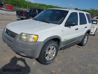 2001 Ford Escape XLT with VIN 1FMYU04151KF69759, listed as a IAAI auction lot 41997906 with 182,133 mi miles. Bid and sale history available at carsss.com. Image 2.