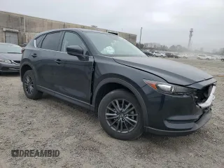 2021 Mazda CX-5 Touring with VIN JM3KFBCM7M1480336, listed as a Copart auction lot 48854415 with 51,774 mi miles and Salvage Title. Bid and sale history available at carsss.com. Image 4.