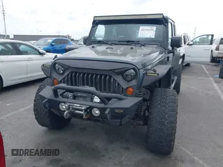 2008 Jeep Wrangler Unlimited Sahara z VIN 1J8GA59138L525836, wystawiony jako IAAI lot #42116359 z przebiegiem 199 600 mil mil oraz . Historia ofert i sprzedaży dostępna na DreamBid. Obrazek 13.