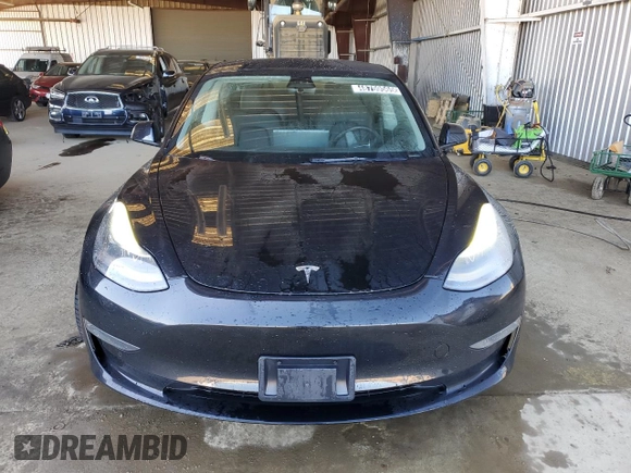 2022 Tesla Model 3 with VIN 5YJ3E1EA2NF190124, listed as a Copart auction lot 48759565 with 137,726 mi miles and Clean Title. Bid and sale history available at carsss.com. Image 5.