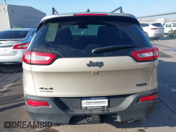 2015 Jeep Cherokee Latitude with VIN 1C4PJMCS4FW578401, listed as a IAAI auction lot 41014082 with 127,465 mi miles. Bid and sale history available at carsss.com. Image 16.