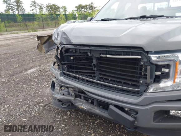 2018 Ford F-150 XL with VIN 1FTEW1EPXJFC85210, listed as a IAAI auction lot 42150759 with 97,660 mi miles and . Bid and sale history available at carsss.com. Image 18.