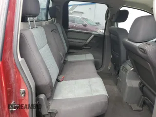 2005 Nissan Titan LE z VIN 1N6AA07B85N556721, wystawiony jako Copart lot #56566275 z przebiegiem 161 847 mil mil oraz Szkoda całkowita • Salvage title. Historia ofert i sprzedaży dostępna na DreamBid. Obrazek 10.