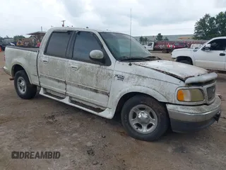 2001 Ford F-150 XLT z VIN 1FTRW07W41KA42743, wystawiony jako IAAI lot #42605714 z przebiegiem 254 360 mil mil oraz . Historia ofert i sprzedaży dostępna na DreamBid. Obrazek 1.