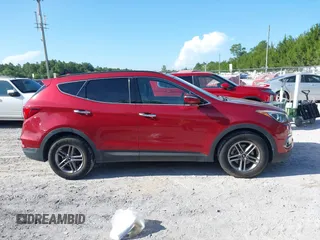2017 Hyundai Santa Fe 2.4L with VIN 5XYZUDLBXHG397691, listed as a IAAI auction lot 42687035 with 115,563 mi miles and . Bid and sale history available at DreamBid. Image 13.