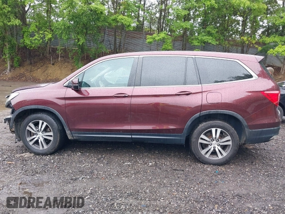 2016 Honda Pilot EX-L with VIN 5FNYF6H5XGB007876, listed as a IAAI auction lot 42366901 with 128,580 mi miles and . Bid and sale history available at DreamBid. Image 14.