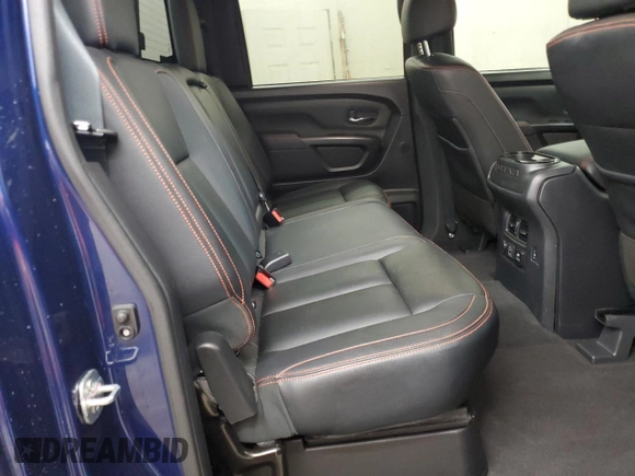 2024 Nissan Titan SV with VIN 1N6AA1FB2RN104714, listed as a Copart auction lot 56576955 with 25,800 mi miles and Salvage title. Bid and sale history available at DreamBid. Image 10.