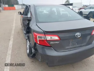 2014 Toyota Camry L with VIN 4T1BF1FKXEU813606, listed as a IAAI auction lot 41528889 with 252,866 mi miles. Bid and sale history available at carsss.com. Image 17.