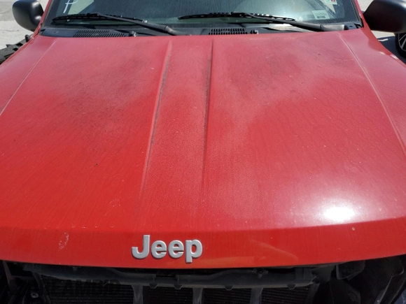 1999 Jeep Grand Cherokee Laredo z VIN 1J4G258SXXC518308, wystawiony jako Copart lot #56636235 z przebiegiem 233 649 mil mil oraz Szkoda całkowita • Salvage title. Historia ofert i sprzedaży dostępna na DreamBid. Obrazek 12.