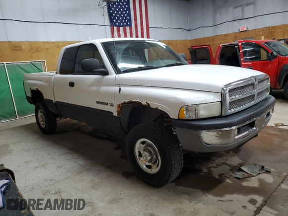 1999 Dodge 2500 with VIN 3B7KF23Z5XG126714, listed as a Copart auction lot 61977325 with 198,740 mi miles and Clean title. Bid and sale history available at DreamBid. Image 4.