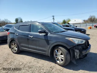 2014 Hyundai Santa Fe Sport with VIN 5XYZWDLA6EG150035, listed as a Copart auction lot 52403585 with 132,846 mi miles and Salvage Title. Bid and sale history available at carsss.com. Image 4.