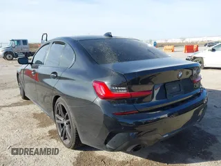 2021 BMW 3 Series 330i z VIN 3MW5R1J05M8B84800, wystawiony jako IAAI lot #41818906 z przebiegiem Nie podano mil oraz . Historia ofert i sprzedaży dostępna na DreamBid. Obrazek 3.