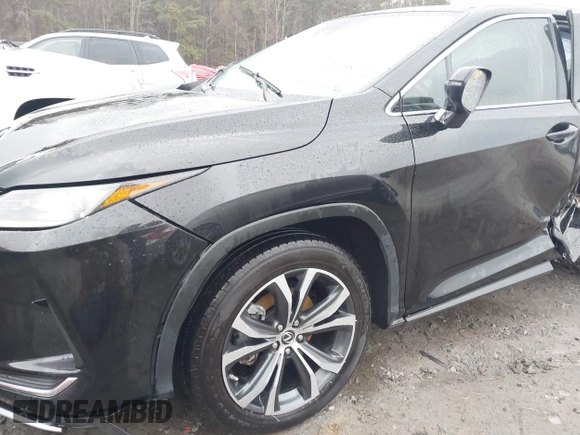 2021 Lexus RX with VIN 2T2HZMAA0MC201749, listed as a IAAI auction lot 41426758 with 148,064 mi miles. Bid and sale history available at carsss.com. Image 17.