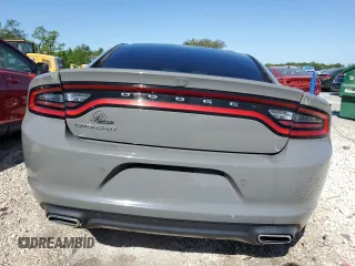 2019 Dodge Charger SXT z VIN 2C3CDXBG9KH657399, wystawiony jako Copart lot #52516215 z przebiegiem 78 035 mil mil oraz Czysty tytuł • Clean title. Historia ofert i sprzedaży dostępna na DreamBid. Obrazek 6.
