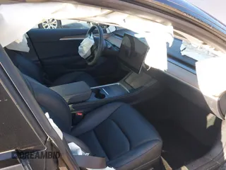 2023 Tesla Model 3 z VIN 5YJ3E1EA1PF681030, wystawiony jako IAAI lot #41545960 z przebiegiem 19 590 mil mil oraz . Historia ofert i sprzedaży dostępna na DreamBid. Obrazek 5.