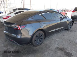2025 Tesla Model 3 Long Range with VIN 5YJ3E1EA5SF978214, listed as a IAAI auction lot 42525444 with 6,489 mi miles and . Bid and sale history available at DreamBid. Image 4.
