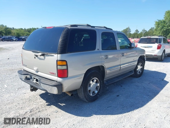 2005 GMC Yukon SLT with VIN 1GKEC13Z15R217223, listed as a IAAI auction lot 42177280 with 257,840 mi miles. Bid and sale history available at carsss.com. Image 4.