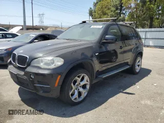 2012 BMW X5 35i with VIN 5UXZV4C51CL744313, listed as a Copart auction lot 58270755 with 97,903 mi miles and Salvage title. Bid and sale history available at DreamBid. Image 1.