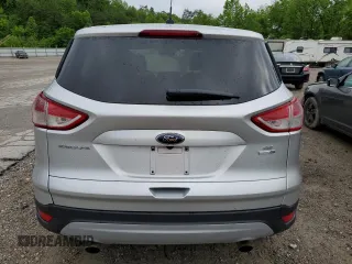 2014 Ford Escape SE with VIN 1FMCU9GX8EUC48467, listed as a Copart auction lot 57269155 with 148,611 mi miles and Salvage title. Bid and sale history available at DreamBid. Image 6.