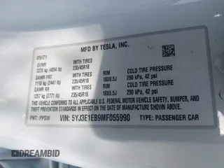 2021 Tesla Model 3 Long Range with VIN 5YJ3E1EB9MF055990, listed as a IAAI auction lot 41584065 with 49,147 mi miles and . Bid and sale history available at carsss.com. Image 9.
