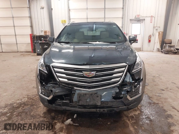 2019 Cadillac XT5 Luxury AWD z VIN 1GYKNDRS0KZ213092, wystawiony jako IAAI lot #41510497 z przebiegiem 26 030 mil mil oraz . Historia ofert i sprzedaży dostępna na DreamBid. Obrazek 12.