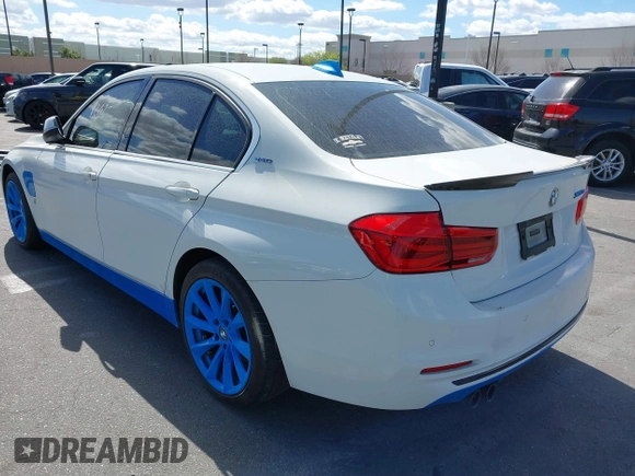2017 BMW 3 Series 330e iPerformance with VIN WBA8E1C51HK895223, listed as a IAAI auction lot 41492625 with 116,486 mi miles. Bid and sale history available at carsss.com. Image 3.