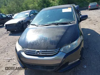 2010 Honda Insight LX with VIN JHMZE2H5XAS018840, listed as a IAAI auction lot 42138165 with 188,467 mi miles and . Bid and sale history available at DreamBid. Image 6.