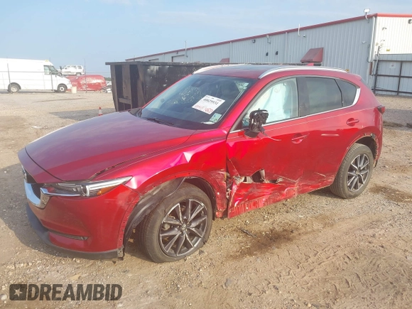 2017 Mazda CX-5 Grand Touring with VIN JM3KFADL8H0189033, listed as a IAAI auction lot 40029931 with 88,933 mi miles and . Bid and sale history available at carsss.com. Image 2.