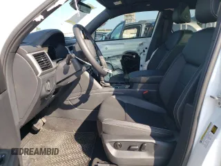 2023 Volkswagen Atlas SE with VIN 1V2JE2CA9PC222811, listed as a Copart auction lot 65216014 with 16,160 mi miles and Salvage title. Bid and sale history available at DreamBid. Image 7.