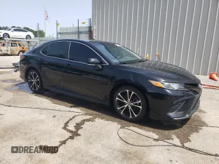 2018 Toyota Camry LE с VIN 4T1B11HKXJU656262, выставлен на аукционе Copart как лот 57132965 с пробегом 106 876 миль миль и Списание • Salvage title. История ставок и продаж доступна на DreamBid. Изображение 4.