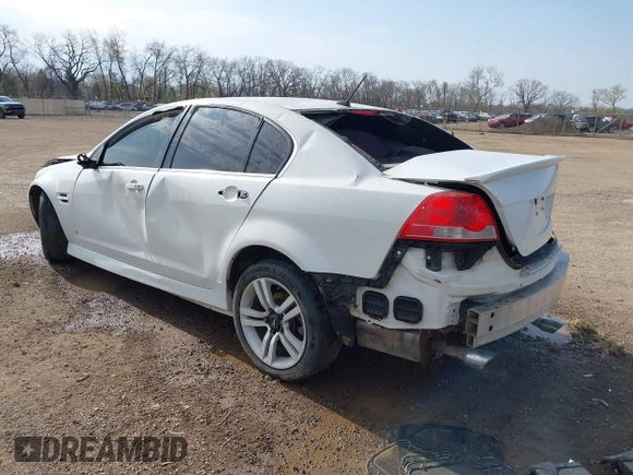 2009 Pontiac G8 with VIN 6G2ER57729L153123, listed as a IAAI auction lot 42046031 with 100,419 mi miles. Bid and sale history available at carsss.com. Image 3.