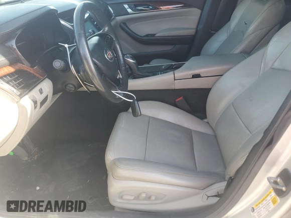 2014 Cadillac CTS Luxury AWD with VIN 1G6AX5SX9E0141473, listed as a Copart auction lot 49163265 with 142,361 mi miles and Salvage Title. Bid and sale history available at DreamBid. Image 7.