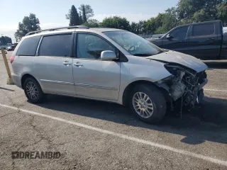 2010 Toyota Sienna XLE with VIN 5TDDK4CC8AS032007, listed as a Copart auction lot 65611495 with 299,904 mi miles and Salvage title. Bid and sale history available at DreamBid. Image 4.