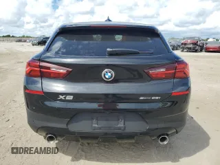 2022 BMW X2 sDrive28i with VIN WBXYH9C0XN5T86256, listed as a Copart auction lot 74173554 with 35,658 mi miles and Salvage Title. Bid and sale history available at carsss.com. Image 6.