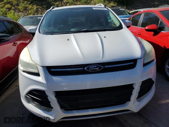2013 Ford Escape SE with VIN 1FMCU9GX9DUD12210, listed as a Copart auction lot 62496095 with 77,516 mi miles and Salvage title. Bid and sale history available at DreamBid. Image 5.