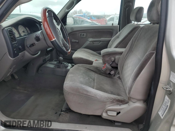 2004 Toyota Tacoma z VIN 5TEWN72NX4Z405026, wystawiony jako Copart lot #49938535 z przebiegiem 171 082 mil mil oraz Szkoda całkowita • Salvage title. Historia ofert i sprzedaży dostępna na DreamBid. Obrazek 7.