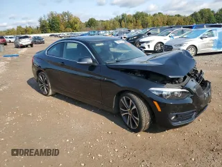 2018 BMW 2 Series 230i xDrive with VIN WBA2J3C57JVA49747, listed as a Copart auction lot 74891334 with Not provided miles and Salvage title. Bid and sale history available at DreamBid. Image 4.