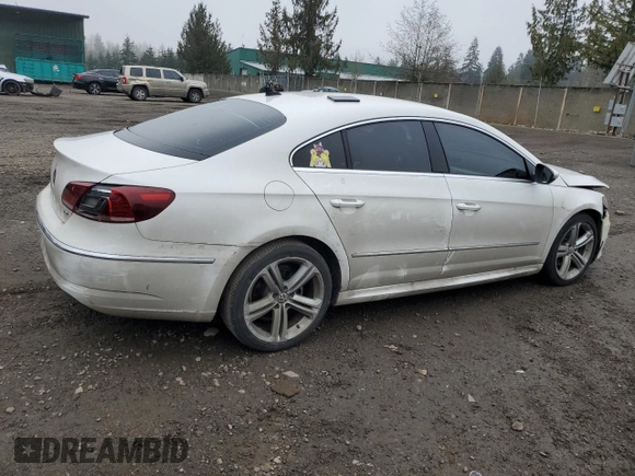 2014 Volkswagen CC Sport with VIN WVWBP7ANXEE512561, listed as a Copart auction lot 88355865 with 140,981 mi miles and Salvage Title. Bid and sale history available at carsss.com. Image 3.