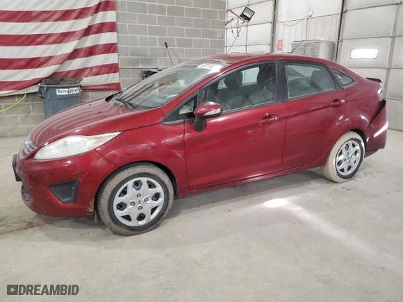 2013 Ford Fiesta SE with VIN 3FADP4BJ0DM215008, listed as a Copart auction lot 52017865 with 124,874 mi miles and Salvage Title. Bid and sale history available at carsss.com. Image 1.